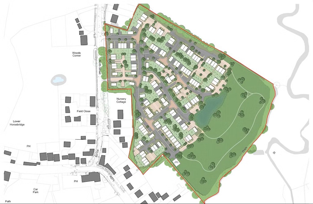 Site plan showing the layout of houses and green space in relation to existing infrastructure.